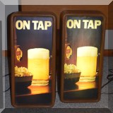 C28. Miller “ON TAP” light up signs.